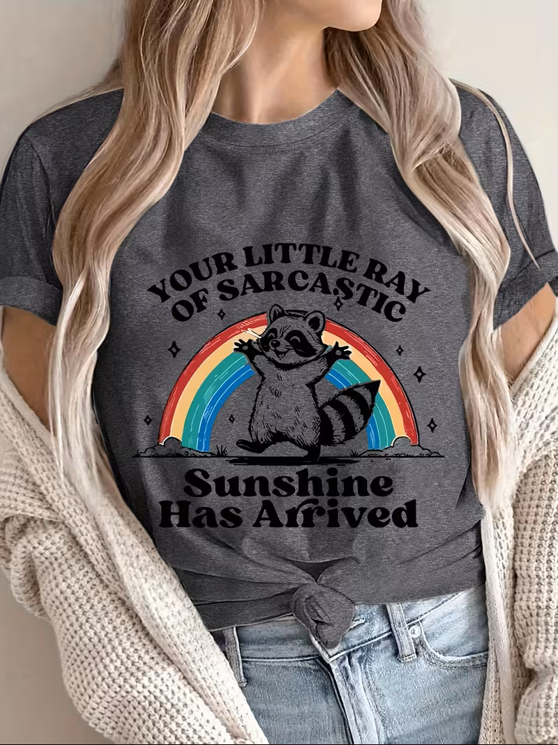 Your Little Ray of Sarcastic Sunshine – Rainbow Raccoon Humor Tee